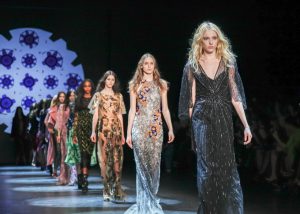 New York, NY, USA - February 13, 2016: Models walk the runway at the Monique Lhuillier runway show during of Fall/Winter 2016 New York Fashion Week at The Arc, Skylight at Moynihan Station, Manhattan.